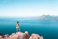 Hiker looking at the Calanques de Piana in Corsica, France