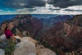 Hiker looking down Cape Royal Overlook Grand Canyon North Rim Wotans Throne Royalty Free Stock Photo