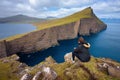 Hiker looking at the lake Sorvagsvatn on Faroe Islands