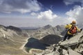 Hiker looking at the landscape of a crater and its volcanic lakes in the Nevado de Toluca in Mexico