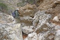 Hiker Looking at a Large Conglomerate Rock Formation Royalty Free Stock Photo