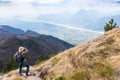 Hiker looking from Monte Chiampon to Friuli-Venezia Giulia