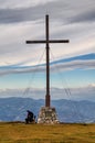 Hiker Making Rest at Summit cross