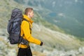 Hiker man with big backpack in mountains Royalty Free Stock Photo