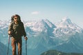 Hiker Man climbing mountains with backpack