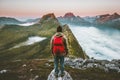 Hiker man exploring sunset mountains with backpack Royalty Free Stock Photo