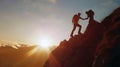 A hiker man helping his friend to reach the mountain top. Sunset sky, mountain scenery in the background. Success concept. Royalty Free Stock Photo