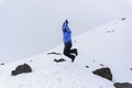 hiker man jumping on the base of chimborazo Mountain in ecuador Royalty Free Stock Photo