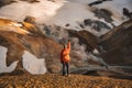 Hiker man standing at Kerlingarfjoll with volcano mountain in summer at Highlands of Iceland