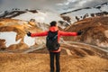 Hiker man standing at Kerlingarfjoll with volcano mountain in summer at Highlands of Iceland