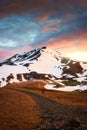 Hiker man walking at Kerlingarfjoll with volcano mountain in summer at Highlands of Iceland