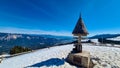 Dreilaendereck - Hiker man at wooden monument at Dreilaendereck, Karawanks, Carinthia, Austria