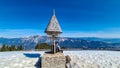 Dreilaendereck - Hiker man at wooden monument at Dreilaendereck, Karawanks, Carinthia, Austria