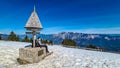 Dreilaendereck - Hiker man at wooden monument at Dreilaendereck, Karawanks, Carinthia, Austria