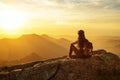 Hiker meets the sunset on the Moro rock in Sequoia national park, California, USA Royalty Free Stock Photo