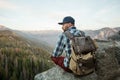 Hiker meets the sunset on the Moro rock in Sequoia national park, California, USA Royalty Free Stock Photo