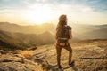 Hiker meets the sunset on the Moro rock in Sequoia national park, California, USA Royalty Free Stock Photo