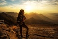 Hiker meets the sunset on the Moro rock in Sequoia national park, California, USA Royalty Free Stock Photo