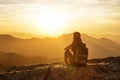 Hiker meets the sunset on the Moro rock in Sequoia national park, California, USA