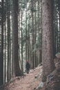 Hiker in mountain moody landscape springtime