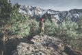 Hiker in mountain moody landscape springtime