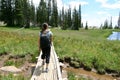 Hiker in the mountains near a lake