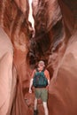 Hiker in narrow canyon Royalty Free Stock Photo
