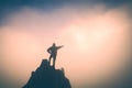 Hiker points to the sunrise. Instagram stylisation Royalty Free Stock Photo