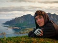 Hiker portrait with Reinefjorden fjord in the background, Lofoten, Norway Royalty Free Stock Photo