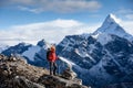 Hiker posing at camera on the trek in Himalayas, Nepal Royalty Free Stock Photo