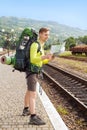 Hiker reading a map Royalty Free Stock Photo