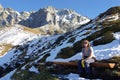 Hiker resting on bench