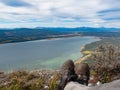 Hiker rests Little Atlin Lake scenery Yukon Canada Royalty Free Stock Photo