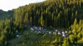 Hiker\'s camp in morning forest in mountains. Top view