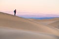 The Hiker at Sand Dune during Sunset at Death Valley National Pa