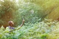 Hiker searching a mobile phone signal, being lost Royalty Free Stock Photo