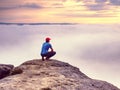 Hiker on sharp cliff of sandstone rock in rock empires park Royalty Free Stock Photo