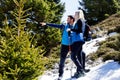 Hiker shows the way in the middle of the mountain