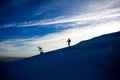 Hiker silhouette at dawn on Mount Ciucas trail in winter Royalty Free Stock Photo