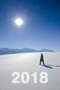 Hiker in snow on the way to new years 2018