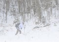 Hiker in snowstorm Royalty Free Stock Photo