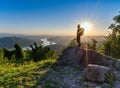 Hiker standing on a rock