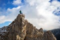 Hiker standing on the top of a hill in Tatra mountains