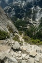 Hiker Stands At the Bottom Of Steep Granite Hill Along Snow Creek Trail