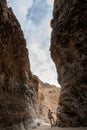 Hiker Stands At The Brink Of The Upper Burro Mesa Pour Off In Big Bend