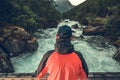 Hiker Staying in Front of Scenic Norwegian River Royalty Free Stock Photo