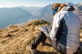 Hiker studying a map.