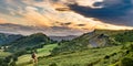 Hiker and sunset over Llangollen panorama