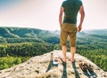 Hiker take break with time for food. Man bring splastic box