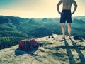 Hiker take break with time for food. Man bring splastic box